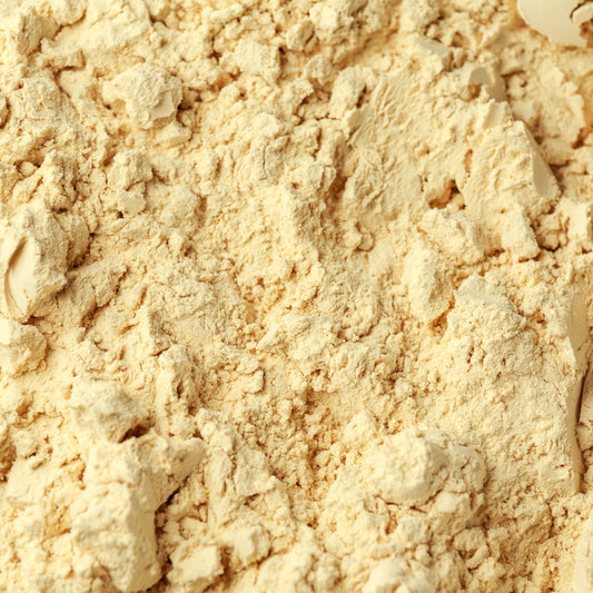 A close-up of Pea Protein Powder from The Herb Shed Wollongong, Australia, showing its finely milled texture and natural pale cream colouring.