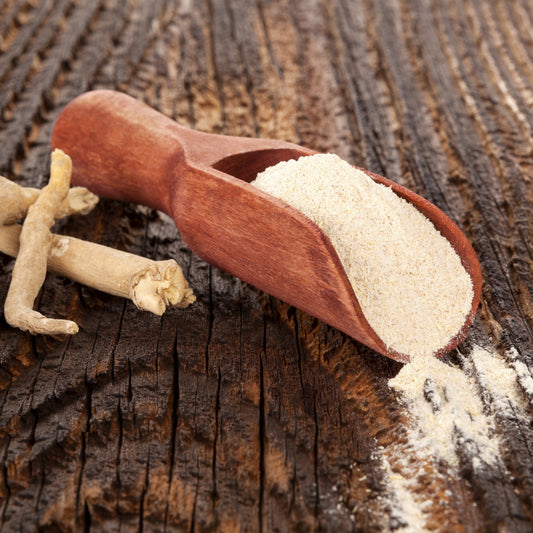 Organic ground ashwagandha powder with wooden scoop from The Herb Shed Wollongong
