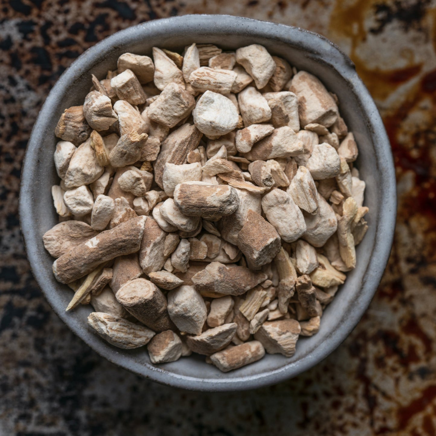 Organic ashwagandha root pieces in bowl from The Herb Shed Wollongong