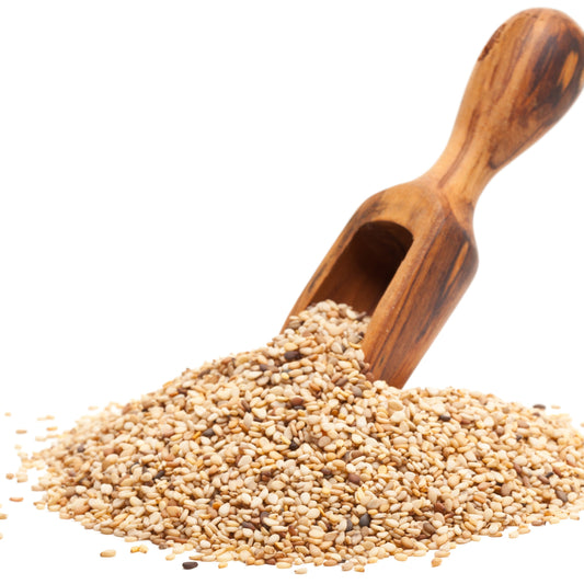 Wooden scoop filled with roasted sesame seeds from The Herb Shed Wollongong