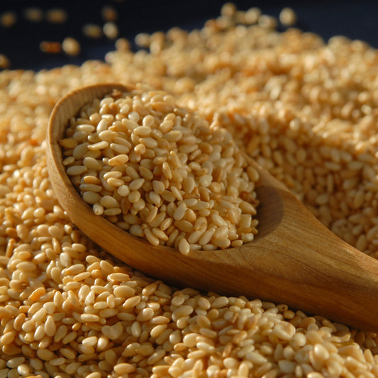 Wooden scoop with roasted sesame seeds from The Herb Shed Wollongong