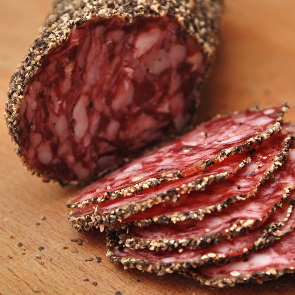 Pepper-crusted salami coated in Cracked Black Pepper, from The Herb Shed Wollongong Australia.