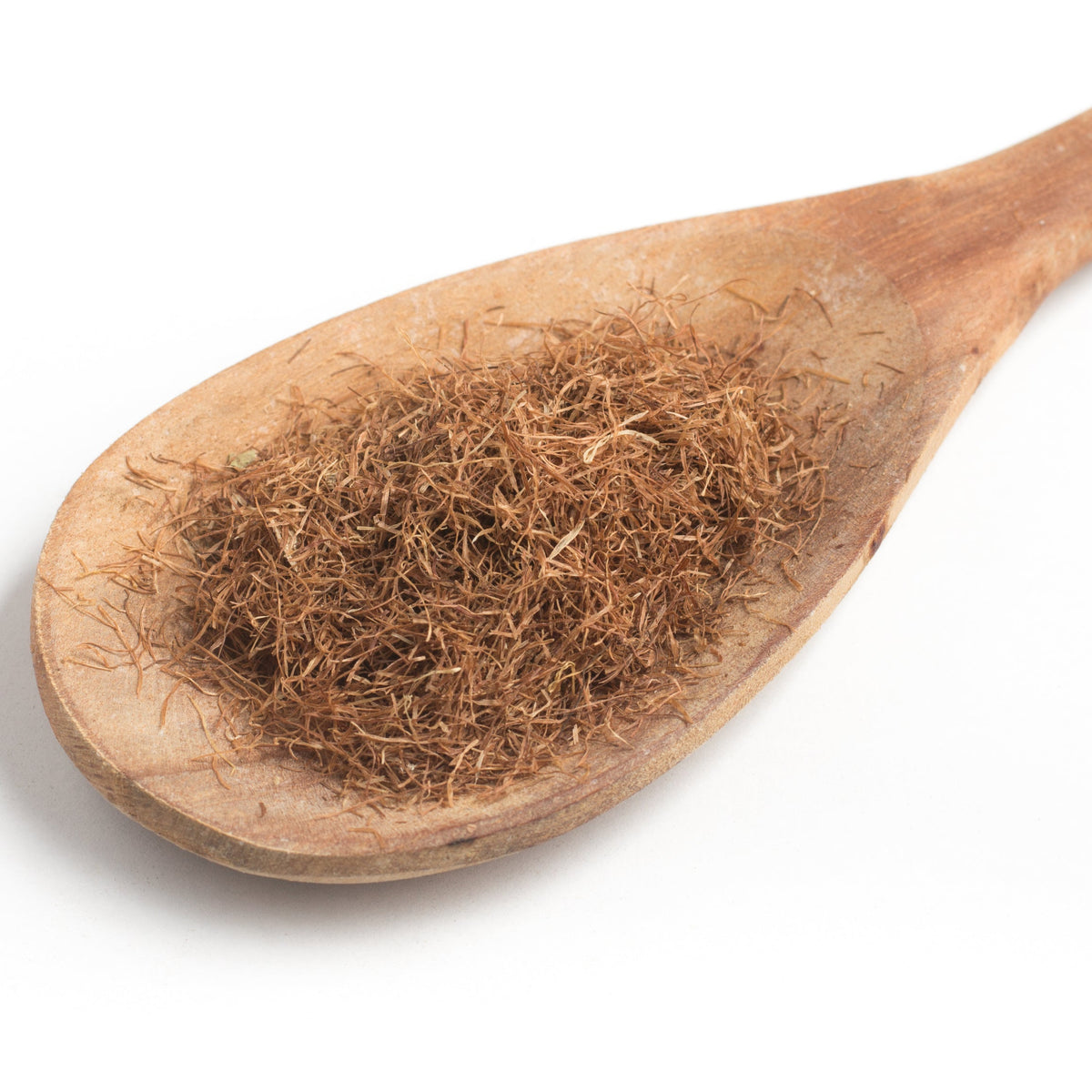Close-up of fine dried cornsilk strands in a wooden spoon, from The Herb Shed Wollongong Australia.