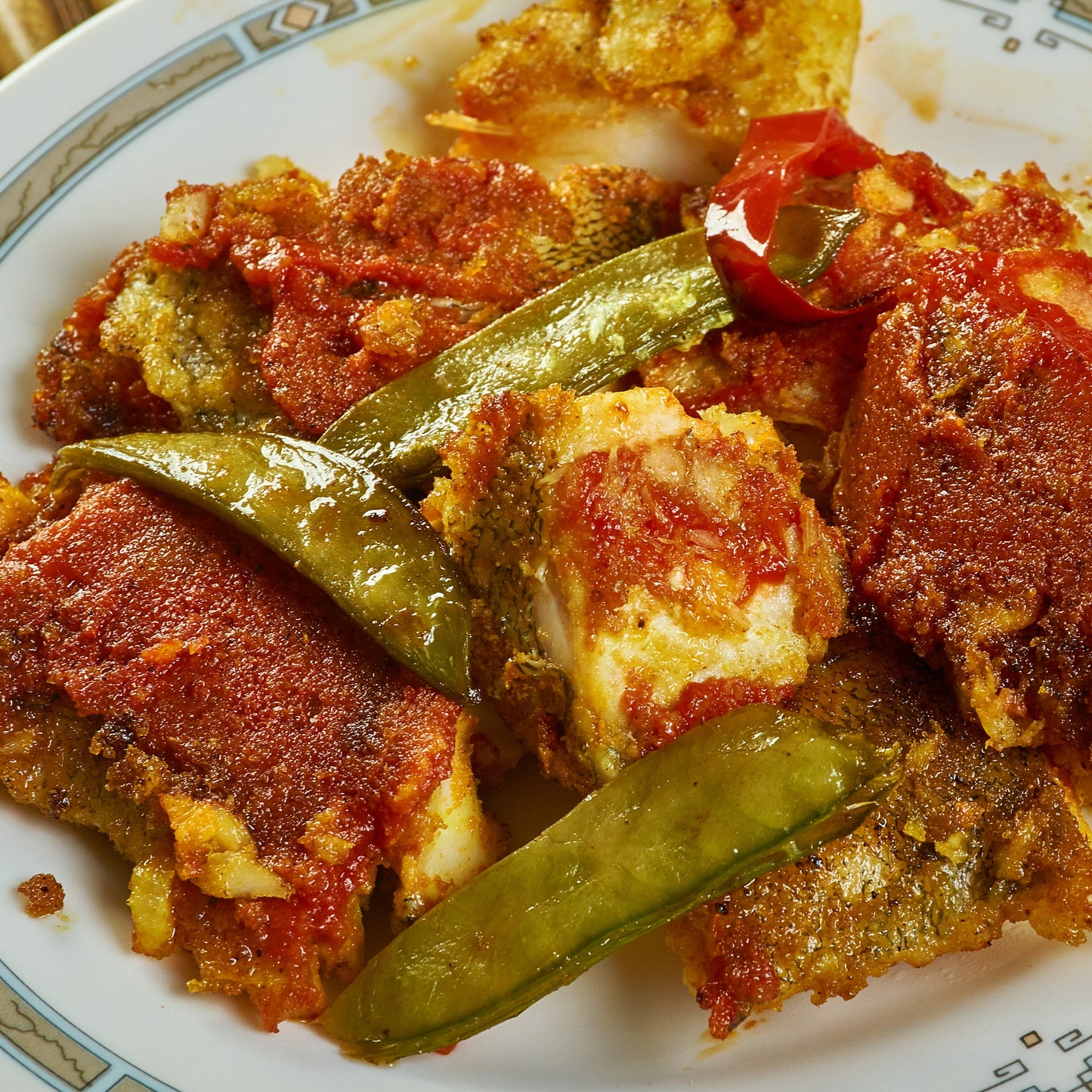 Kashmiri Gaadh, a traditional Kashmiri fish curry, is prepared with fish and a combination of spices including Kashmiri chilli powder, showing a cooking use for The Herb Shed Kashmiri Chilli Powder.