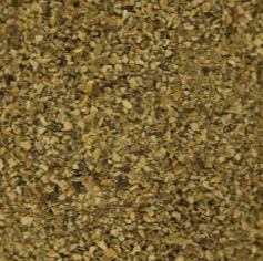 A close-up of Australian Seaweed Meal showing the finely ground green and brown texture of the dried seaweed product.