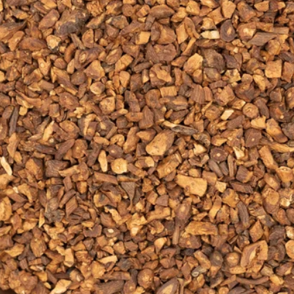 A close-up of organic roasted dandelion root pieces showing their chopped, coarse texture and rich toasted brown colouring.