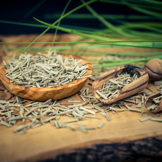 A close-up of Organic Lemongrass Dried from The Herb Shed Wollongong, Australia, showing the thin cut pieces with their naturally pale green and straw colouring and fibrous texture.