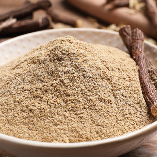 A close-up of Organic Licorice Root Powder from The Herb Shed Wollongong, Australia, showing its finely ground texture and naturally pale earthy brown colouring.