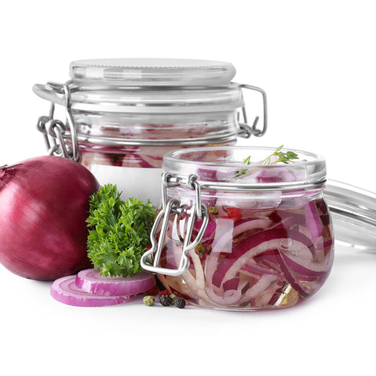 The Preserve clip lid jar filled with pickled red onions, showing the 1 litre glass jar from The Herb Shed Wollongong used for homemade preserving and pantry storage.