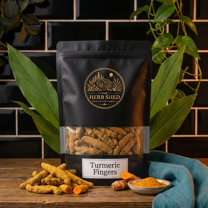 A black stand-up pouch of The Herb Shed Turmeric Fingers displayed with turmeric in a kitchen setting, Wollongong Australia.