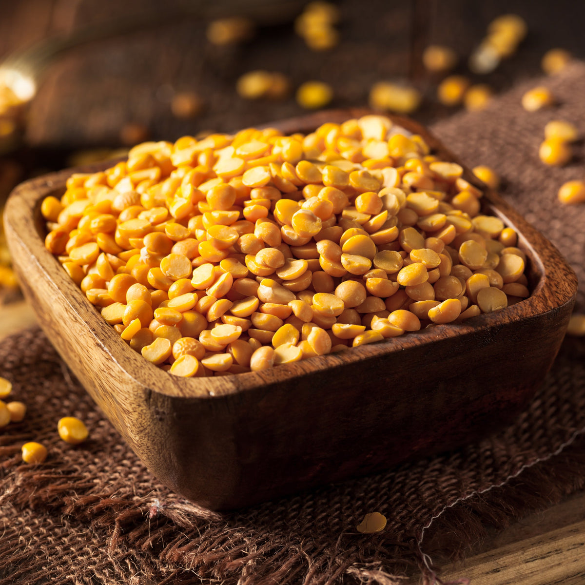 Yellow Split Peas displayed in a rustic bowl, from The Herb Shed Wollongong Australia.
