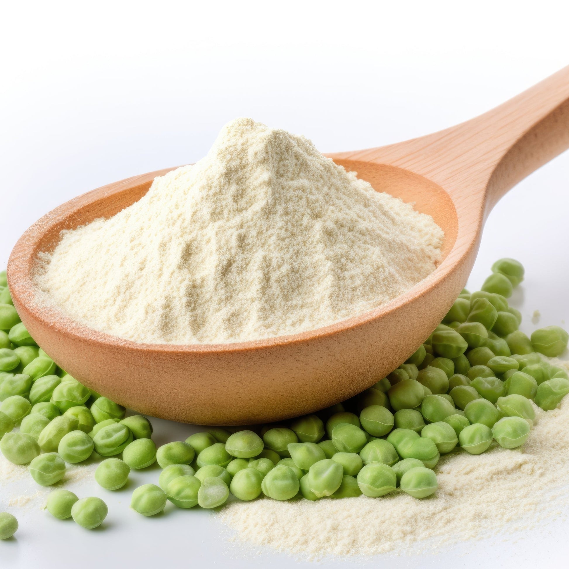 Close-up of pea protein powder on a wooden spoon surrounded by peas – smooth pale plant protein from The Herb Shed Wollongong