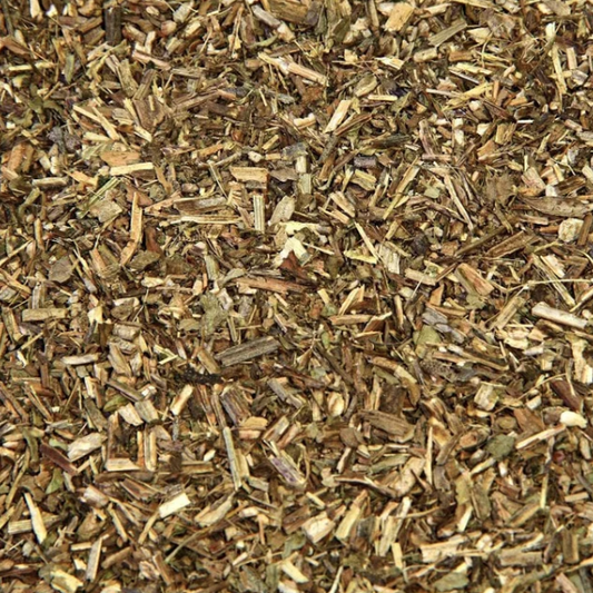 Close-up of shredded vervain herb showing fine cut texture for herbal tea blends.