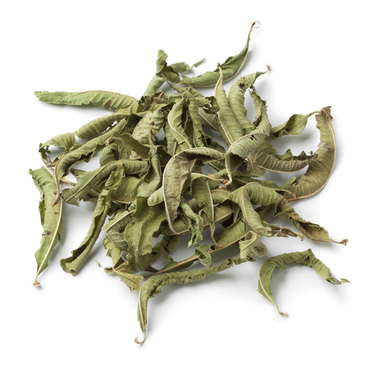Whole dried vervain leaves curled and scattered on a white background – The Herb Shed Wollongong
