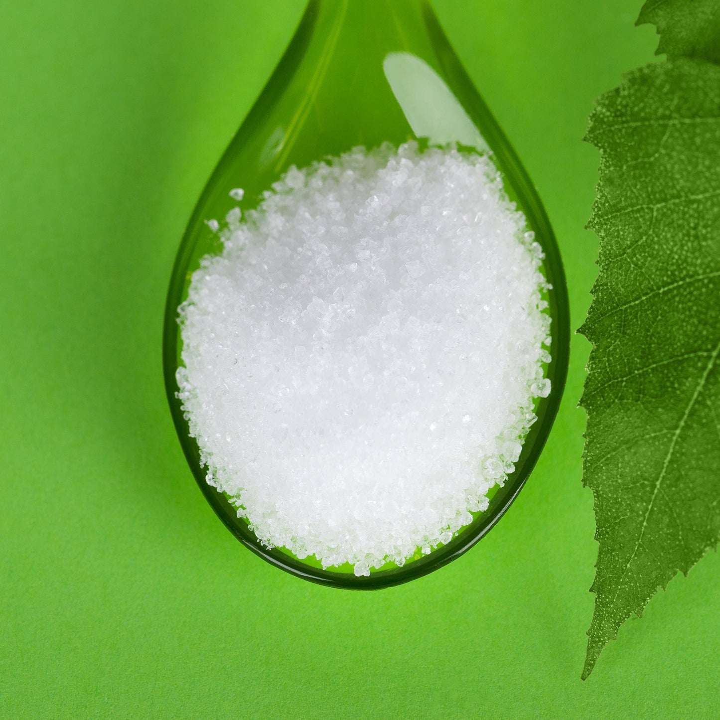 Xylitol sweetener powder in spoon